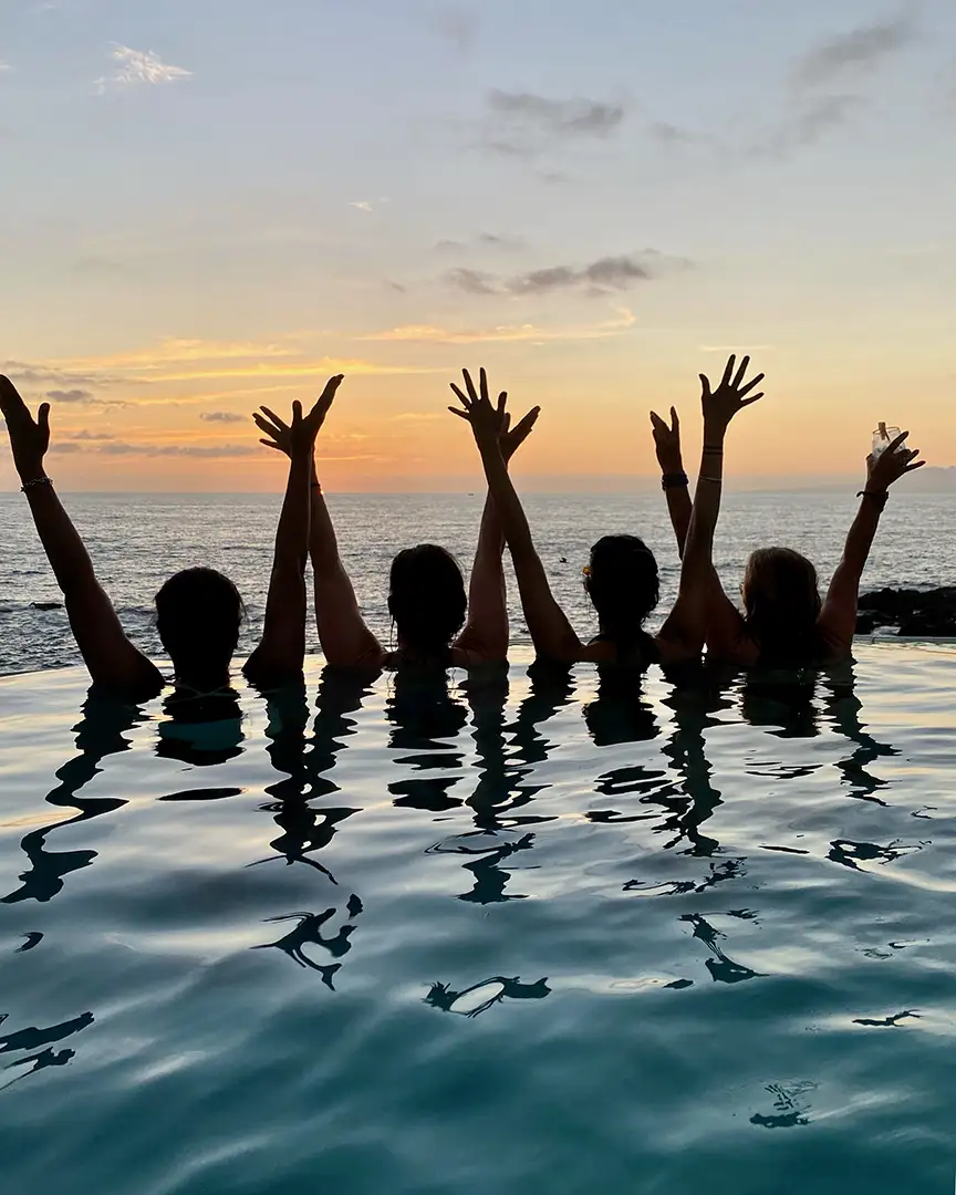 Sunset toast in the pool
