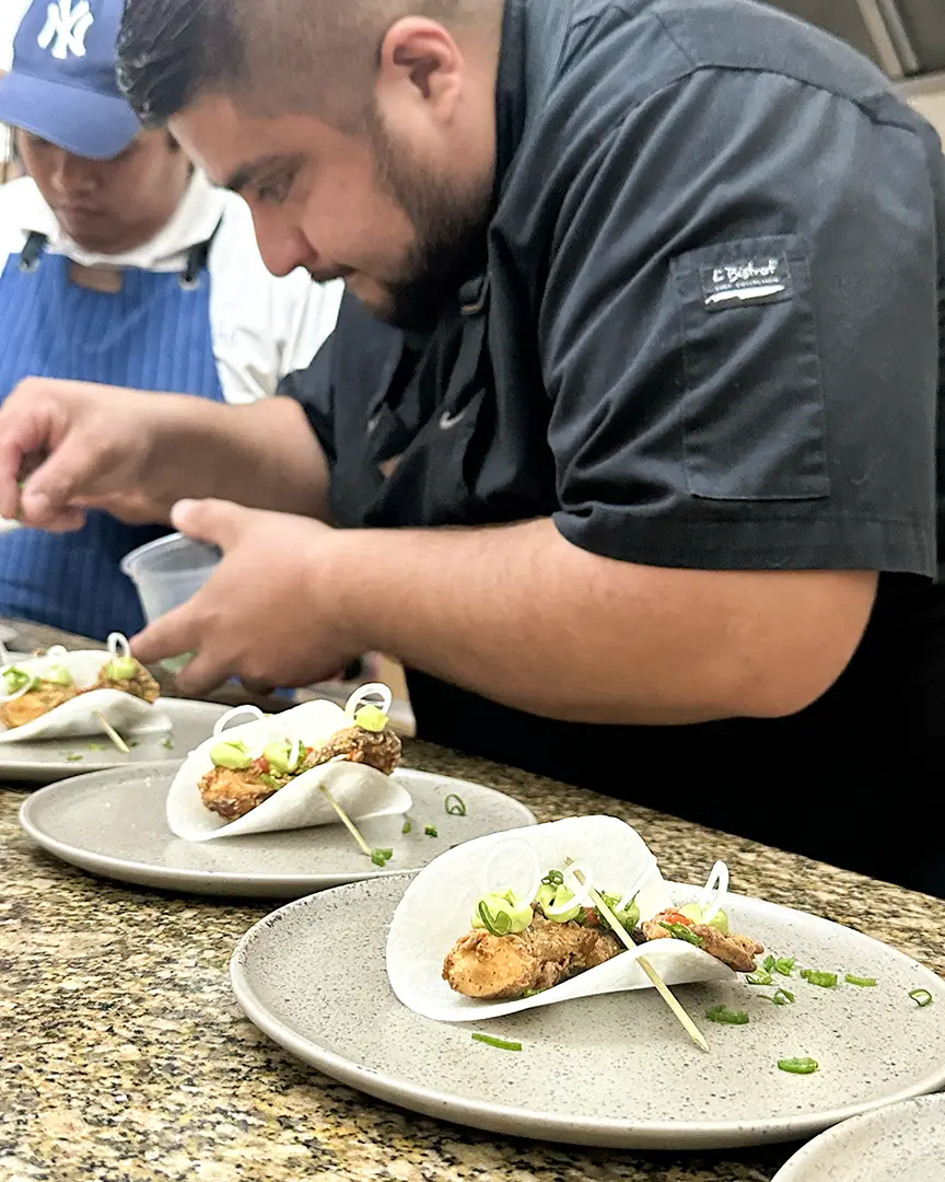 Chef finishing a plate